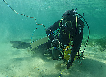 Diver with measuring equipment